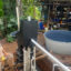 Laura Sofía García Canto, a program manager at Plenitud, works on the water treatment system installation at the nonprofit in Las Marías, Puerto Rico.