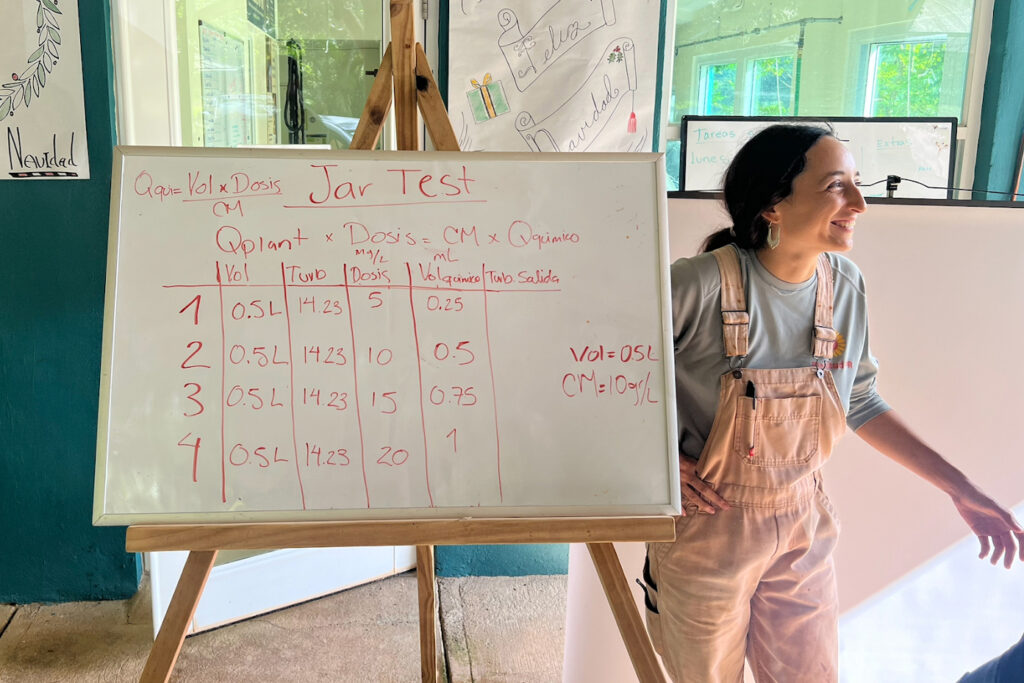 Laura Sofia García Canto presents during a session at Plenitud in December, when team members learned how to properly dose chemicals in the system.