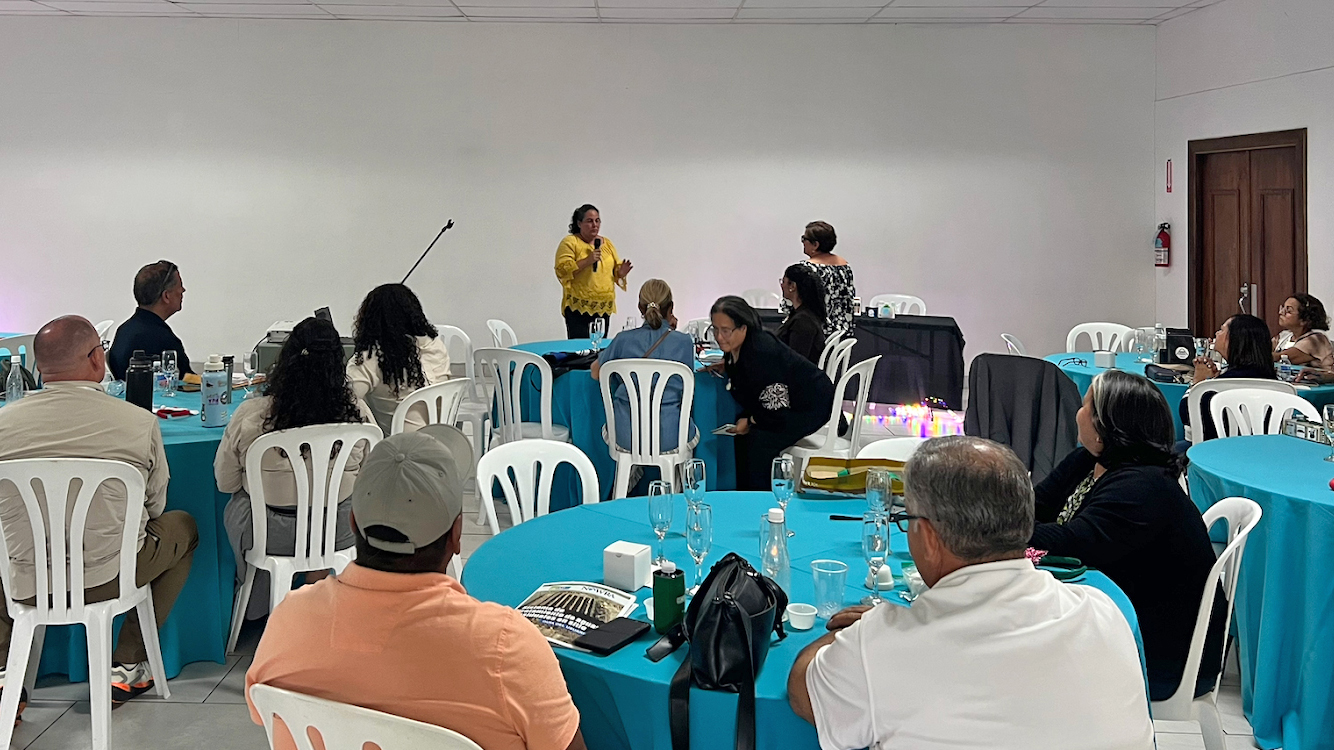 Miriam Matos Díaz speaks to attendees at a workshop in Cayey, Puerto Rico, in December.