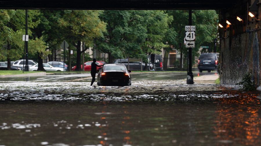 Rain is falling harder and faster around Chicago, creating more severe flooding. Experts say it’s going to get worse, creating an urgency to plan ahead. Credit: Pat Nabong/Sun-Times