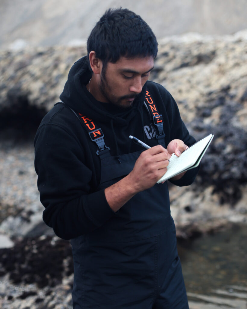 A biology class visits Duxbury Reef on April 25. Credit: Claire Barber/Inside Climate News