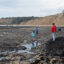 People visit the Duxbury Reef on April 25 in Bolinas, Calif. Credit: Claire Barber/Inside Climate News