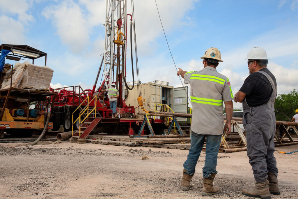 A crew with Weisinger Incorporated drills a pilot hole at the City of Corpus Christi’s eastern wellfield, one of several emergency water projects, on March 31. Credit: Dylan Baddour/Inside Climate News
