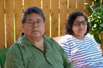 Planada residents David and Rita Rodriguez are concerned over expansion plans from a nearby dairy farm in Le Grand, Calif. Credit: Steven Rodas/Inside Climate News