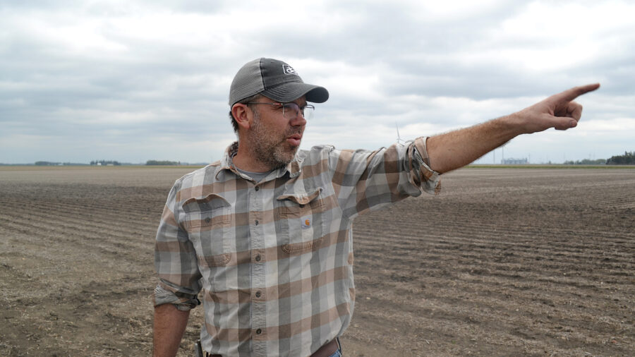 Matthew Bormann, a fifth-generation farmer, is one-third of a trio of growers in Iowa’s flat and fertile Des Moines Lobe. Credit: Anika Jane Beamer/Inside Climate News