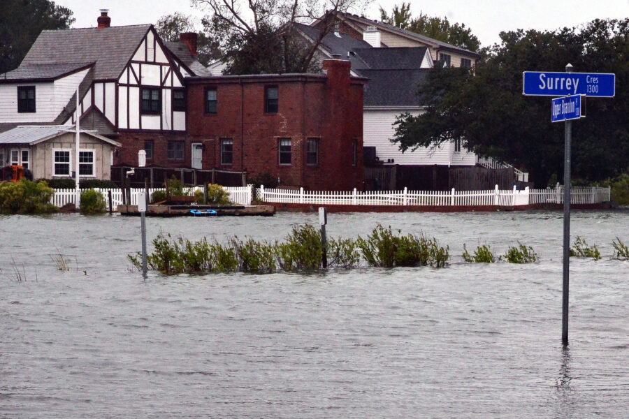 Tidal flooding fills the streets in Norfolk, Va., on Oct. 3, 2022. Credit: Jim Morrison/The Washington Post via Getty Images