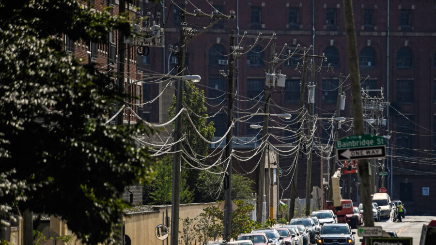 Power lines run along a neighborhood in Philadelphia. Credit: Matthew Hatcher/AFP via Getty Images