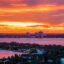 An aerial view over Miami’s Biscayne Bay at sunset. Credit: Jeffrey Greenberg/Universal Images Group via Getty Images