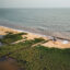 A shrinking mangrove forest is seen at the edge of the Freetown Peninsula coastline in Sierra Leone on April 12. Credit: Gemma Bonfiglioli/AFP via Getty Images