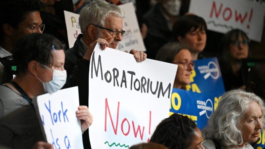 Environmental advocates and lawmakers hold a rally in support of the data center moratorium legislation on May 13 at the Capitol in Albany, N.Y. Credit: Will Waldron/Albany Times Union via Getty Images