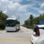 A bus pulls out from the entrance of Alligator Alcatraz in the Florida Everglades on June 1. Credit: Joe Raedle/Getty Images