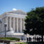 People gather in front of the Supreme Court on June 25 in Washington, D.C. Credit: Tom Williams/CQ-Roll Call, Inc via Getty Images