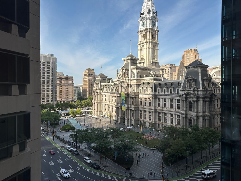 A view of Philadelphia City Hall from the offices of the Philadelphia Energy Authority. The independent municipal agency overlooks the building that governs its budget and planning at a local level. Credit: Daniel Perrin/Inside Climate News