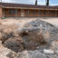 A pit in the parking lot of the First Baptist Church in Grandfalls, Texas, where the Railroad Commission plugged a wellbore that was previously gushing thousands of gallons of wastewater a minute. Credit: Martha Pskowski/Inside Climate News