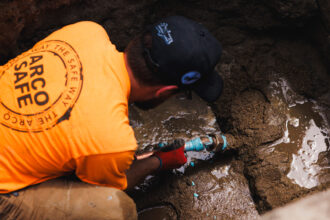 Kyle Perez works on installing a new copper water line at a home in the West Ridge neighborhood of Chicago on July 25, 2025. Credit: Anthony Vazquez/Sun-Times