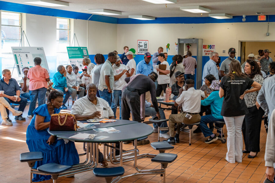 Hayneville residents gather in a middle school now closed due to a declining local population for an open house with developers of a proposed hyperscale data center campus. Credit: Lee Hedgepeth/Inside Climate News