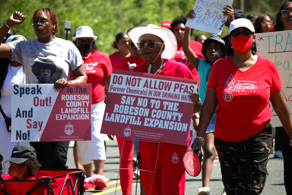 Viv Tolson Wayne marches with her sorority sisters in St. Pauls on April 18. Credit: Morgan Casey