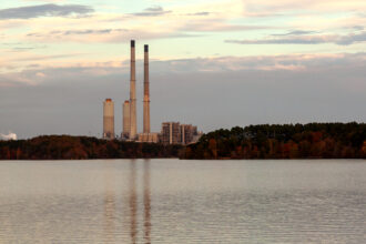 Duke Energy’s coal-fired Roxboro plant sits on the shores of Hyco Lake in Person County. Credit: Lisa Sorg/Inside Climate News