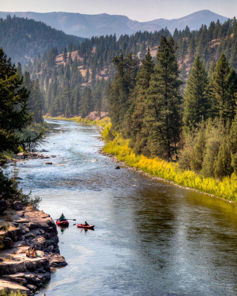 People paddle down the Blackfoot River in Missoula, Mont. Credit: Bob Wick/Bureau of Land Management