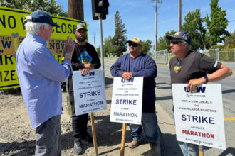Rep. Mark DeSaulnier, who represents the county where Marathon’s Martinez Renewables operates, visits striking workers in early May. Credit: Courtesy of USW Local 5