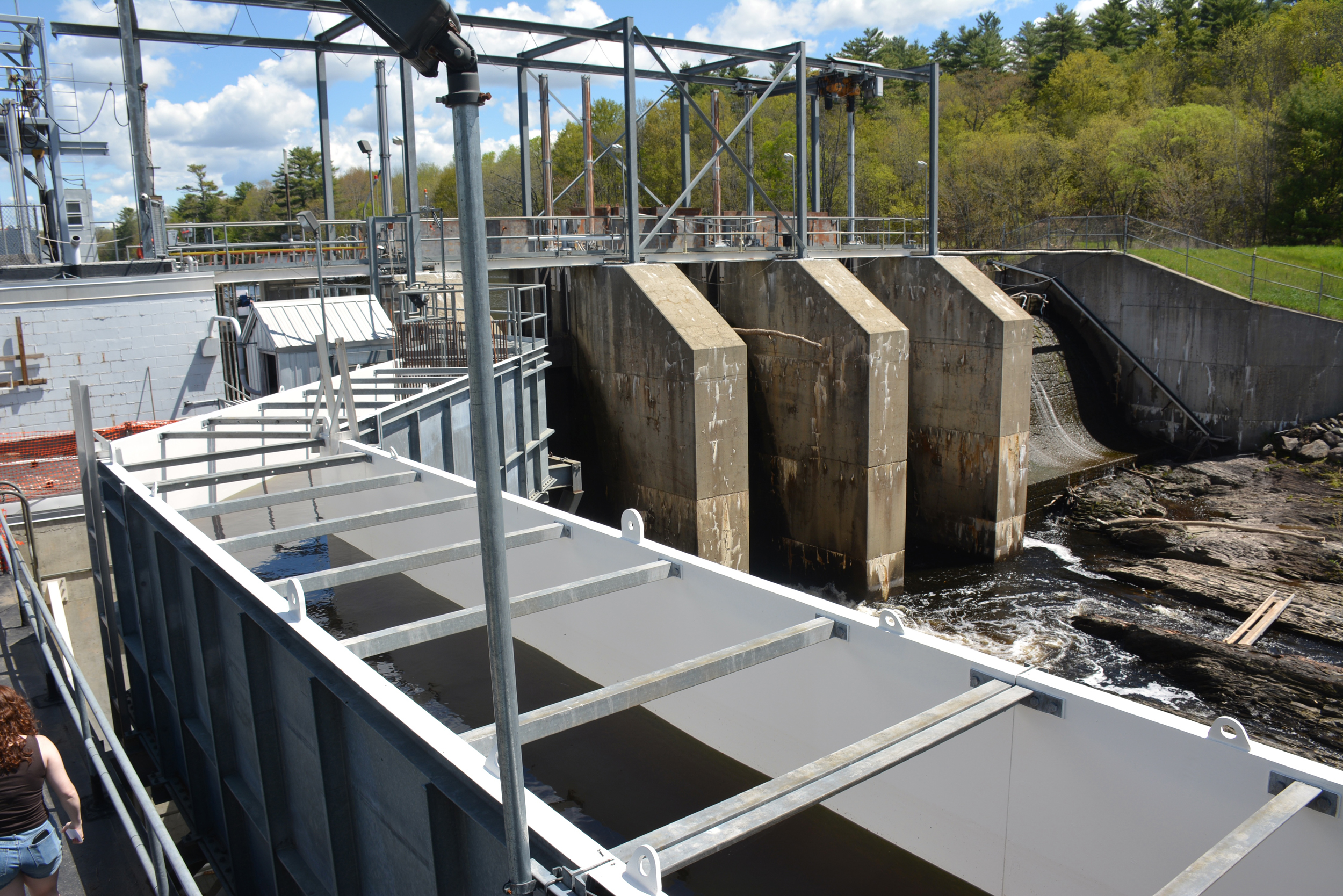 The hydroelectric Benton Falls Dam was impassable for alewives until the construction of a fish lift and chute in 2006. Last year, more than 9 million alewives were counted crossing the dam. Credit: Sydney Cromwell/Inside Climate News