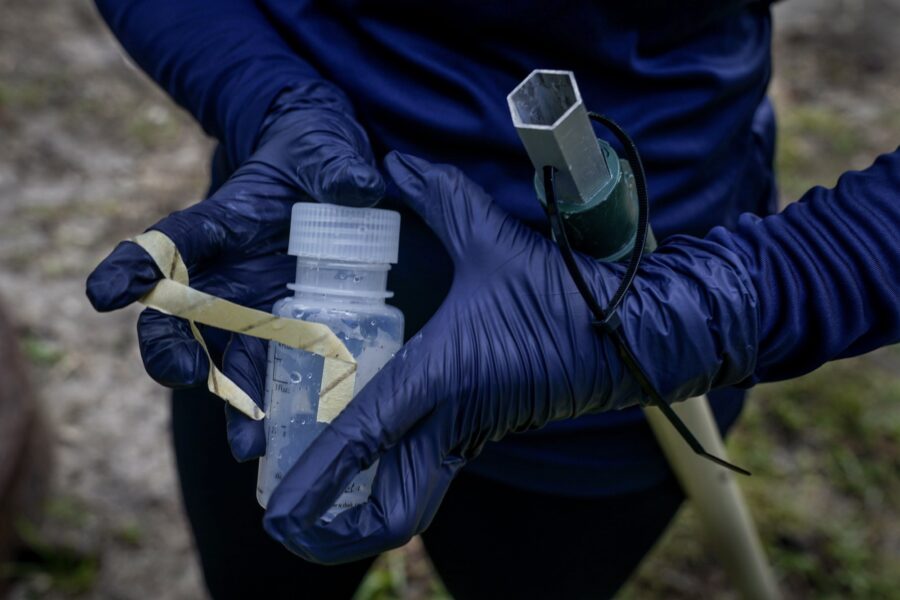 Aliza Karim from Miami Waterkeepers tests the water quality in the Little River on October 26, 2023, in Miami Dade County, Flordia. Credit: Jahi Chikwendiu/The Washington Post via Getty Images