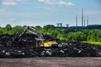 The shuttered Homer City Generating Station sits in the background of a coal cleanup site in Center Township, Pa., on June 12, 2024. Credit: Scott Lewis/The Washington Post via Getty Images