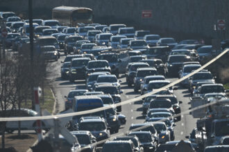 Traffic clogs a highway on Jan. 15 in Charlotte, N.C. Part of the Environmental and Climate Justice Block Grant Program was intended to help CleanAIRE NC install air quality monitors throughout Mecklenburg County. Credit: Peter Zay/Anadolu via Getty Images