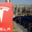Electric vehicles sit at a Tesla dealership on April 8 in Long Beach, Calif. Credit: Eric Thayer/Los Angeles Times via Getty Images