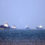 Ships sit anchored in the Strait of Hormuz in southern Iran on May 4. Credit: Amirhossein Khorgooei/AFP via Getty Images