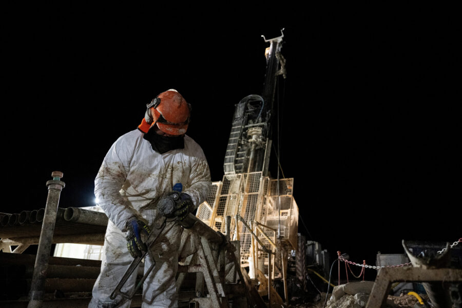 A worker extracts a drill core at a copper mining project in the Andes mountain range of Calingasta, Argentina, on April 21. Credit: Luis Robayo/AFP via Getty Images