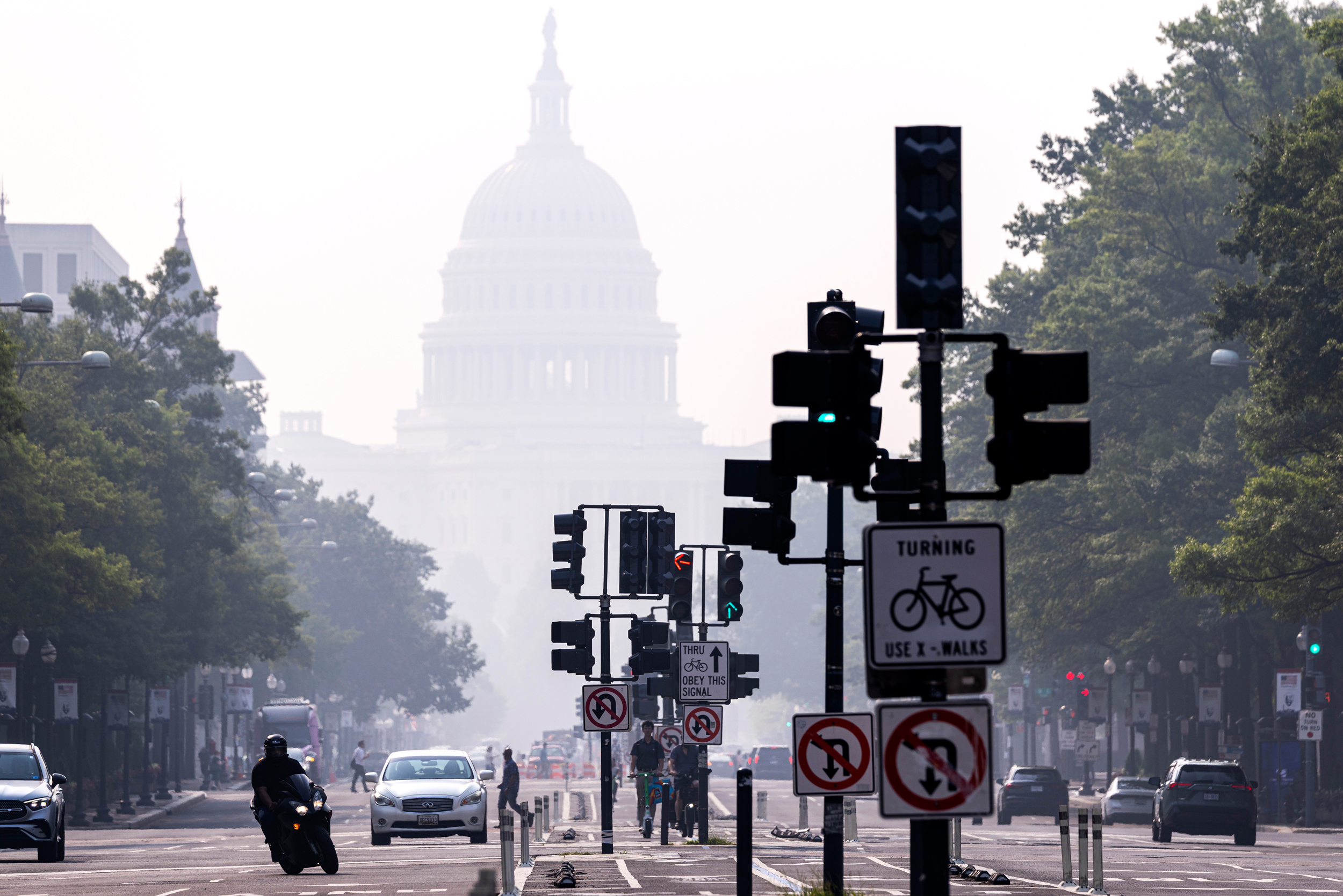 Smoke from Canadian wildfires cast a haze over the U.S. Capitol Building on July 17 in Washington, D.C. Credit: Finn Gomez/Getty Images