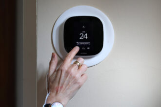 An ecobee smart thermostat is set up in a home in Toronto, Ontario. Credit: Richard Lautens/Toronto Star via Getty Images