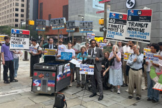 State Sen. Nikil Saval speaks at a June 26 rally for transit funding outside of the Independence Hall subway stop in Philadelphia. Credit: Daniel Perrin/Inside Climate News