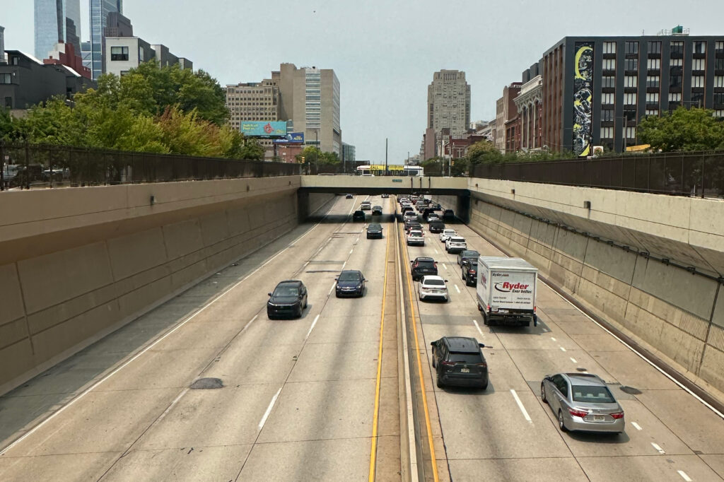Expressway traffic travels through Chinatown on the sunken I-676. Credit: Daniel Perrin/Inside Climate News