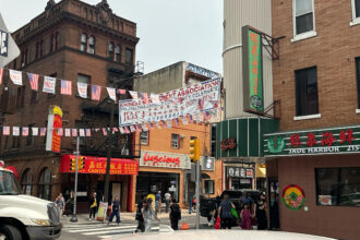 The streets of Philadelphia’s Chinatown are crowded with pedestrians and traffic. Credit: Daniel Perrin/Inside Climate News