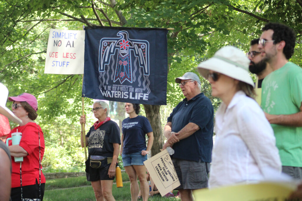 People attend a rally against Virginia legislature’s inaction on data centers. Credit: Charles Paullin/Inside Climate News