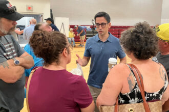 Karl Brutsaert, SB Energy’s development head, speaks to residents about the company’s proposed gas power plant in Pike County, Ohio. Credit: Dan Gearino/Inside Climate News