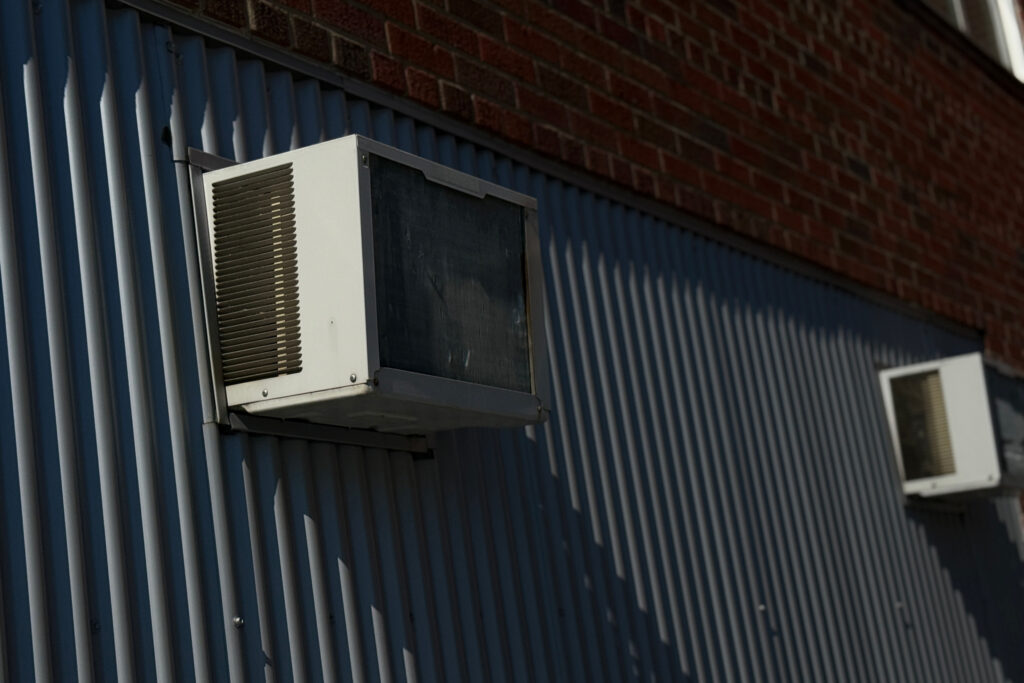Window air-conditioning units are seen at a Missoula County Public Schools building on June 25. Credit: Mosabber Hossain/Inside Climate News