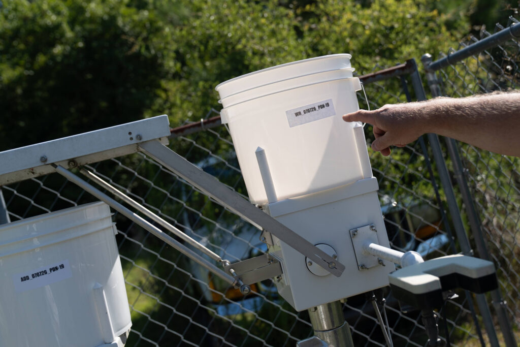An air and rainwater sampling station installed by NC DEQ at Mike Watters’ home in Grays Creek. Credit: Mehmet Demirci/Inside Climate News