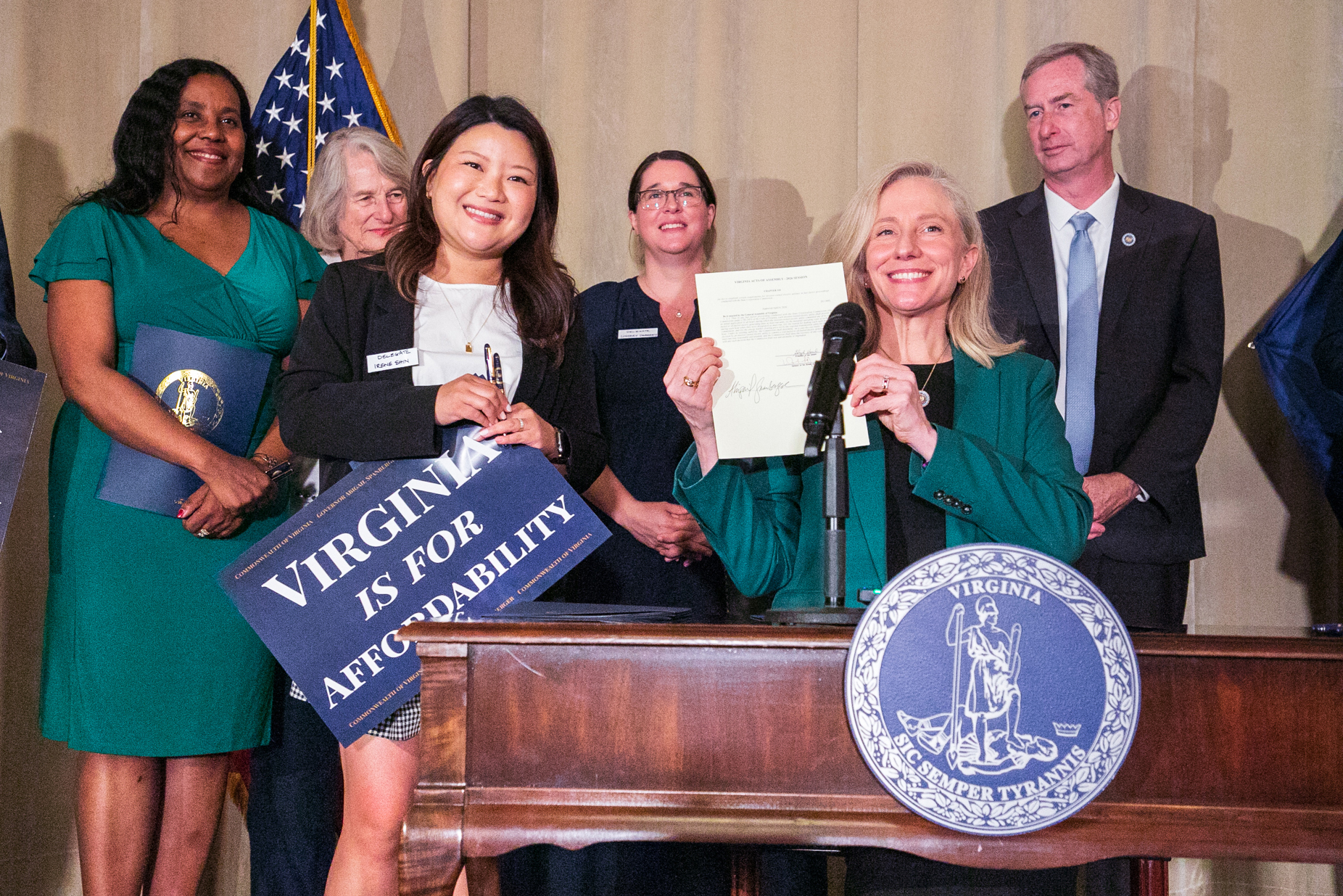 Virginia Delegate Irine Shin (left) stands with Gov. Abigail Spanberger during a RGGI bill signing event in Richmond on June 30. Credit: Phuong Tran/SELC