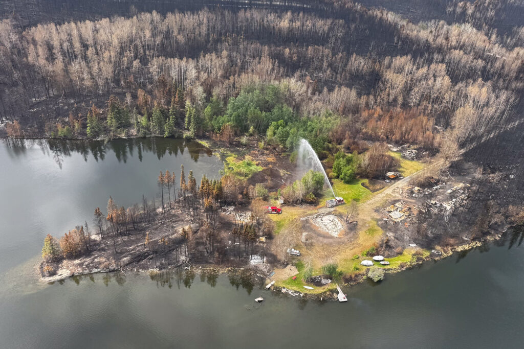 Federal firefighting personnel from the U.S. provide wildfire suppression support in Canada in June 2025. Credit: National Interagency Fire Center