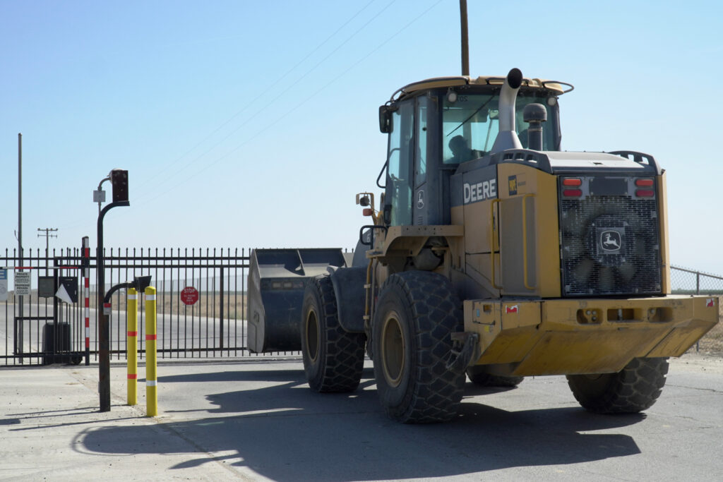 A tractor at the front gate of Bar 20. Credit: Steven Rodas/Inside Climate News