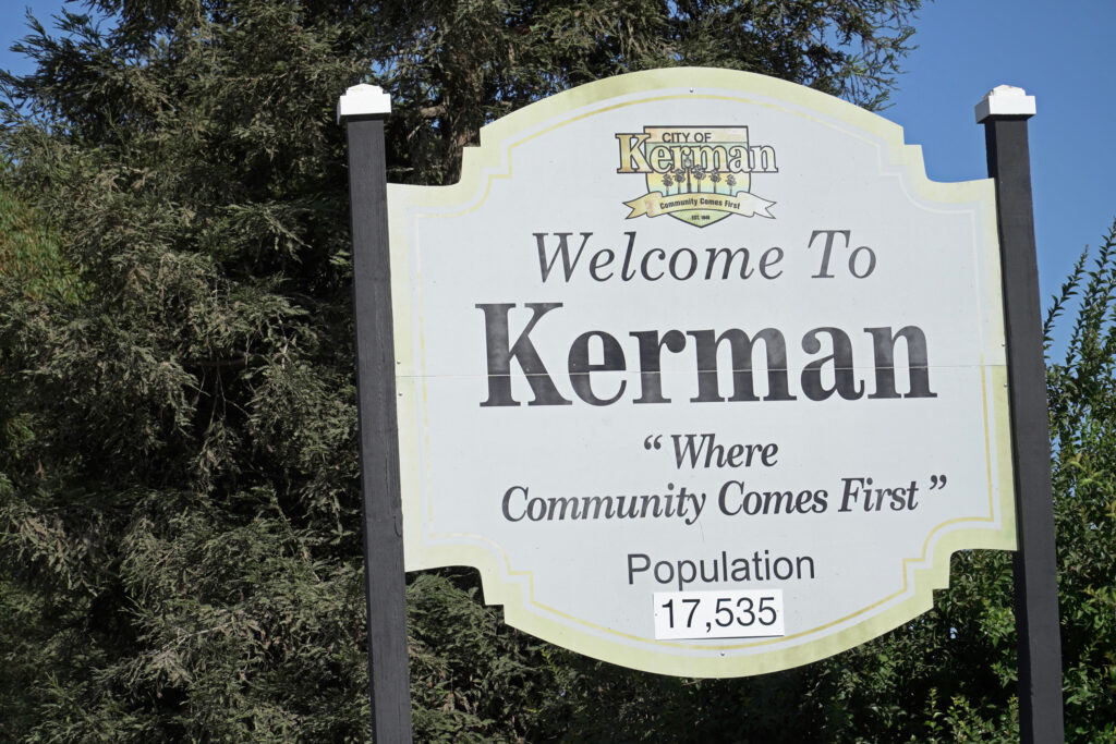 A “Welcome to Kerman” sign near the Bar 20 dairy farm. Credit: Steven Rodas/Inside Climate News