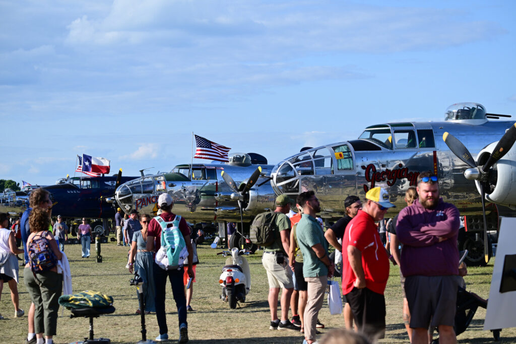 Several airworthy World War II bombers on ground display during AirVenture. Credit: Andrew Liu/Inside Climate News