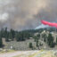 An air tanker drops fire retardant near Maverick Mountain Ski Area as crews work to slow the Sand Creek Fire in southwestern Montana on Aug. 12. Credit: Beaverhead-Deerlodge National Forest Wildland Fire Information