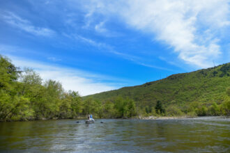 People fish on the Lehigh River in Pennsylvania’s Poconos Mountains. Credit: Natalie Kolb/MediaNews Group/Reading Eagle via Getty Images