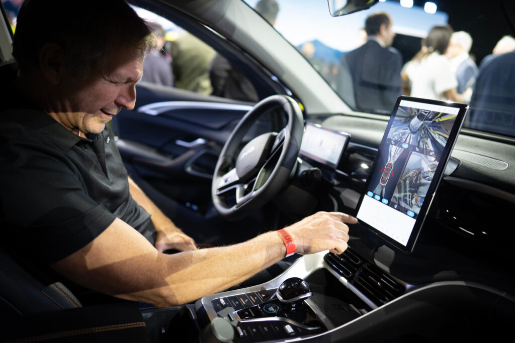 A visitor inspects the interior of a BYD car during a launch event in Buenos Aires, Argentina, on Oct. 8, 2025. Credit: Martin Zabala/Xinhua via Getty Images