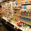 A woman shops for dairy products at a grocery story in New York City on April 9. Credit: Charly Triballeau/AFP via Getty Images