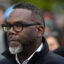Chicago Mayor Brandon Johnson participates in a May Day march on May 1. Credit: Scott Olson/Getty Images